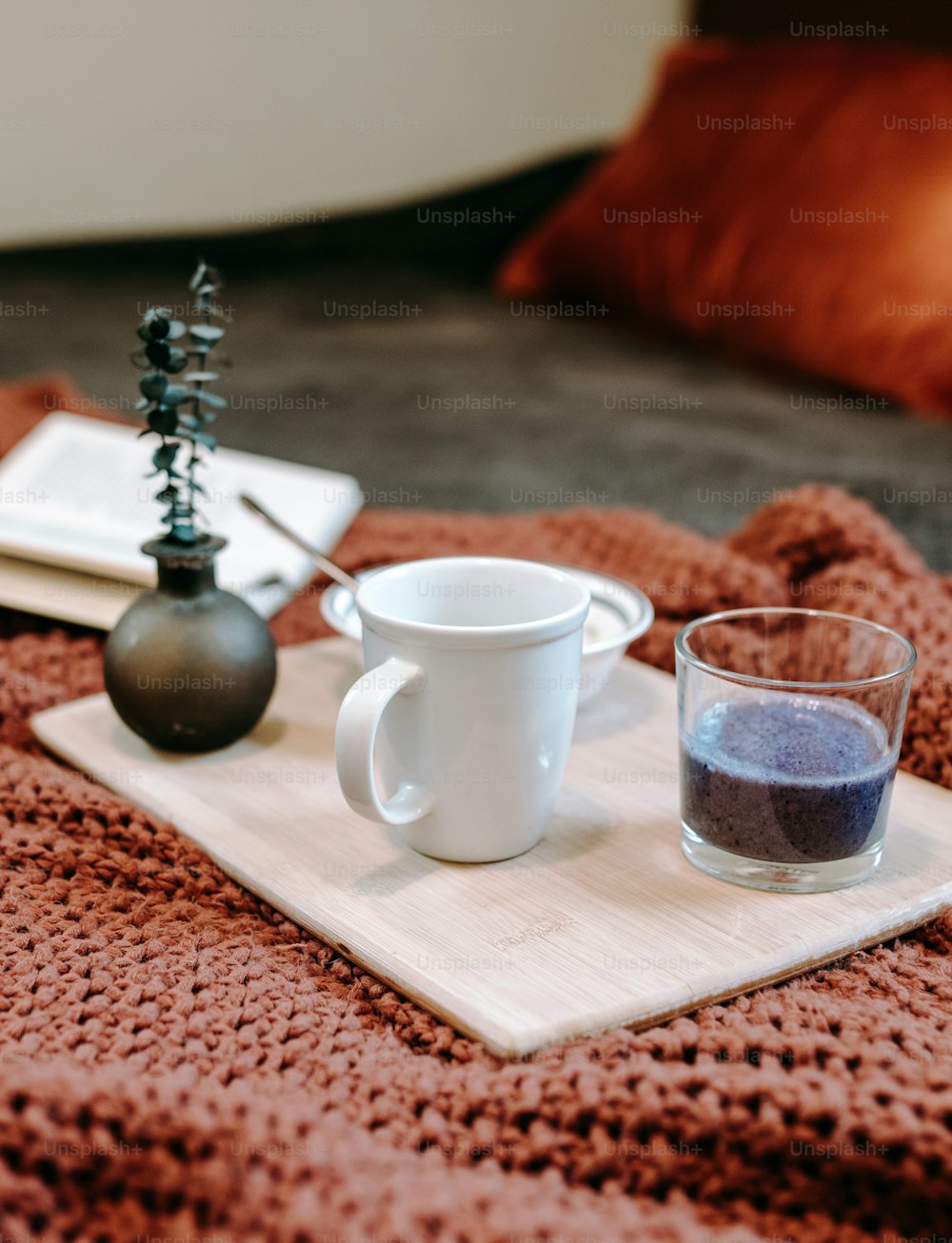 a tray with a cup and saucer on it