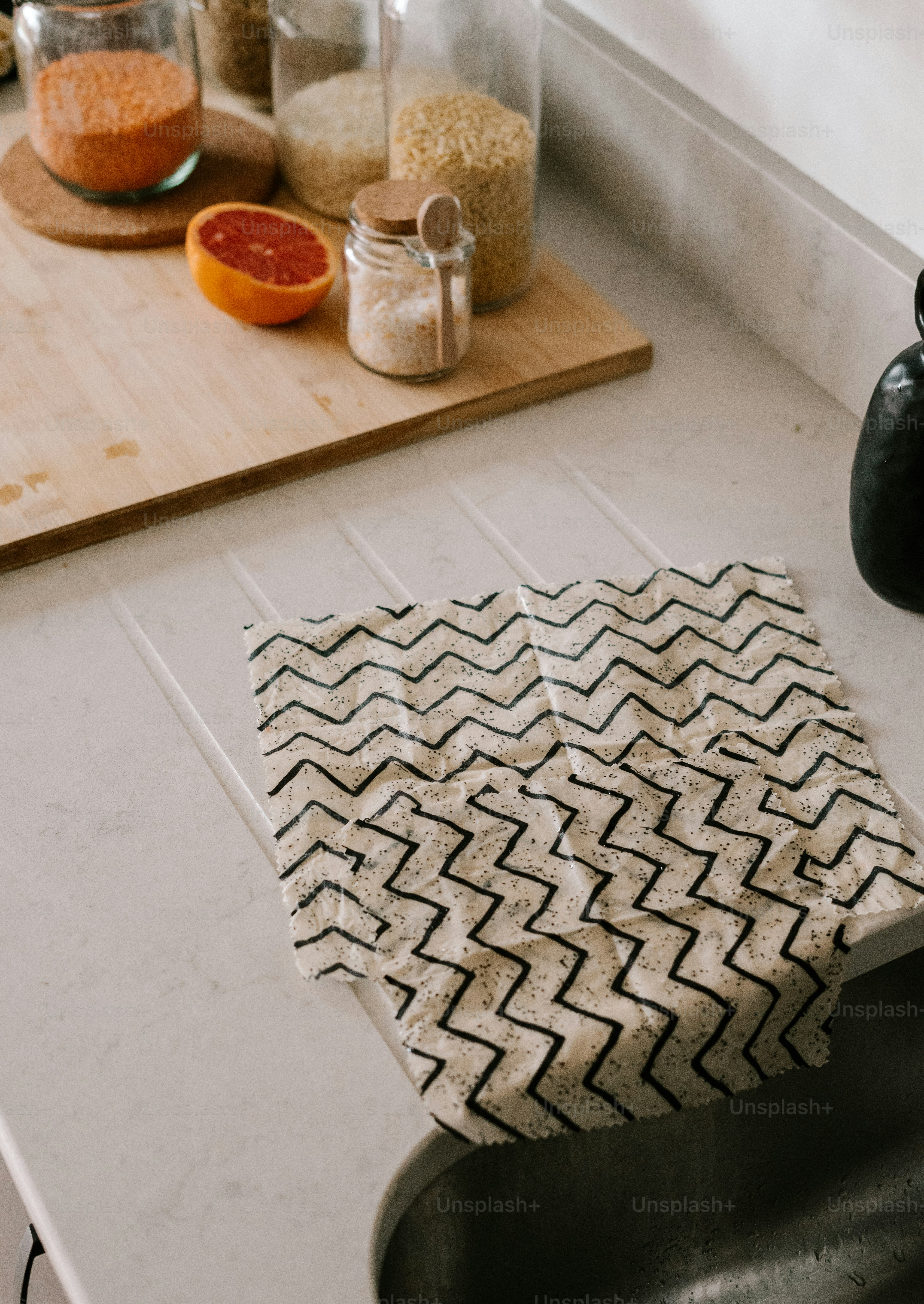 a kitchen counter with a cutting board and a cutting board on it