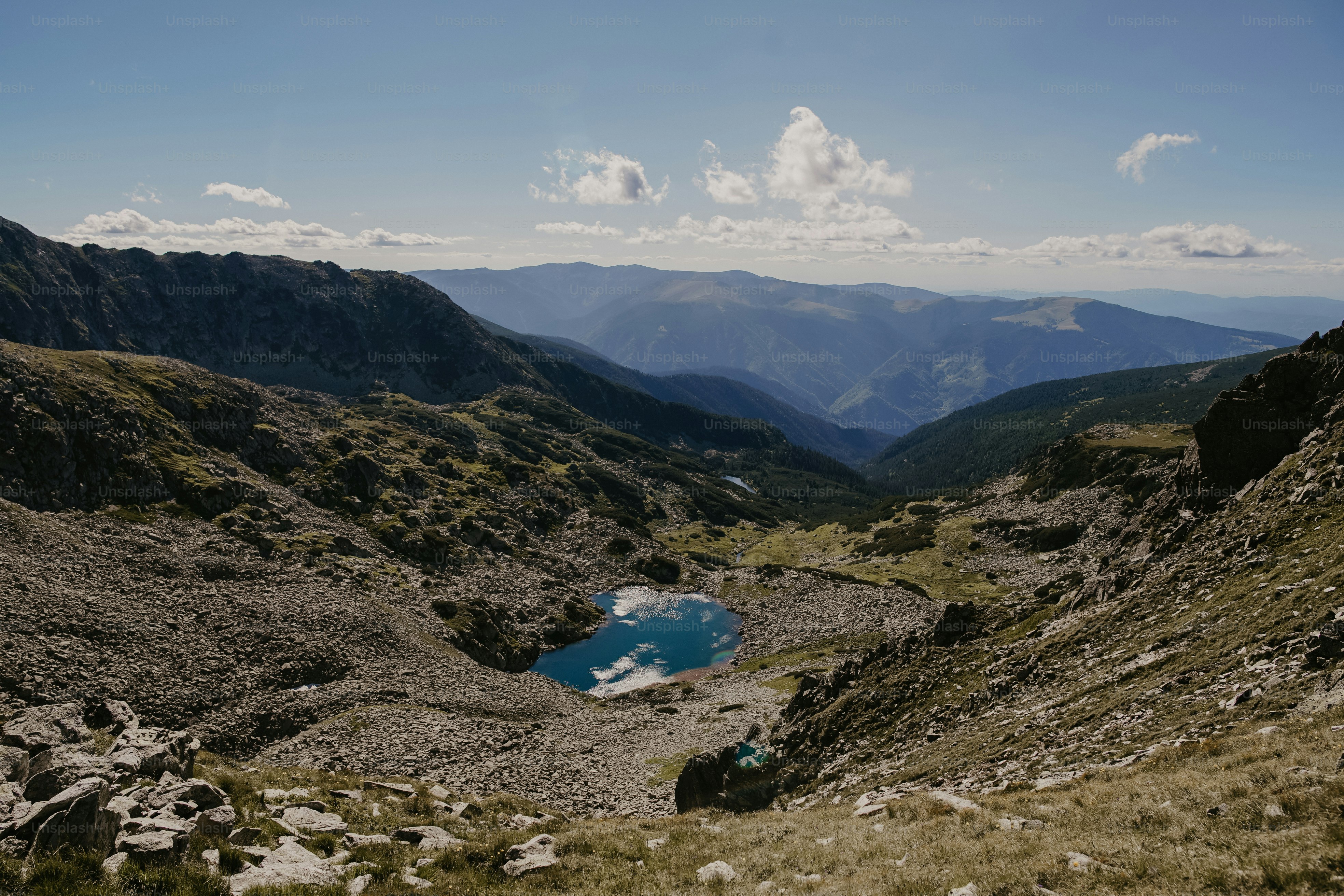 a lake in the middle of a mountain range