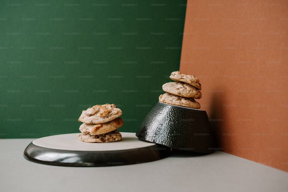 a stack of cookies sitting on top of a white plate