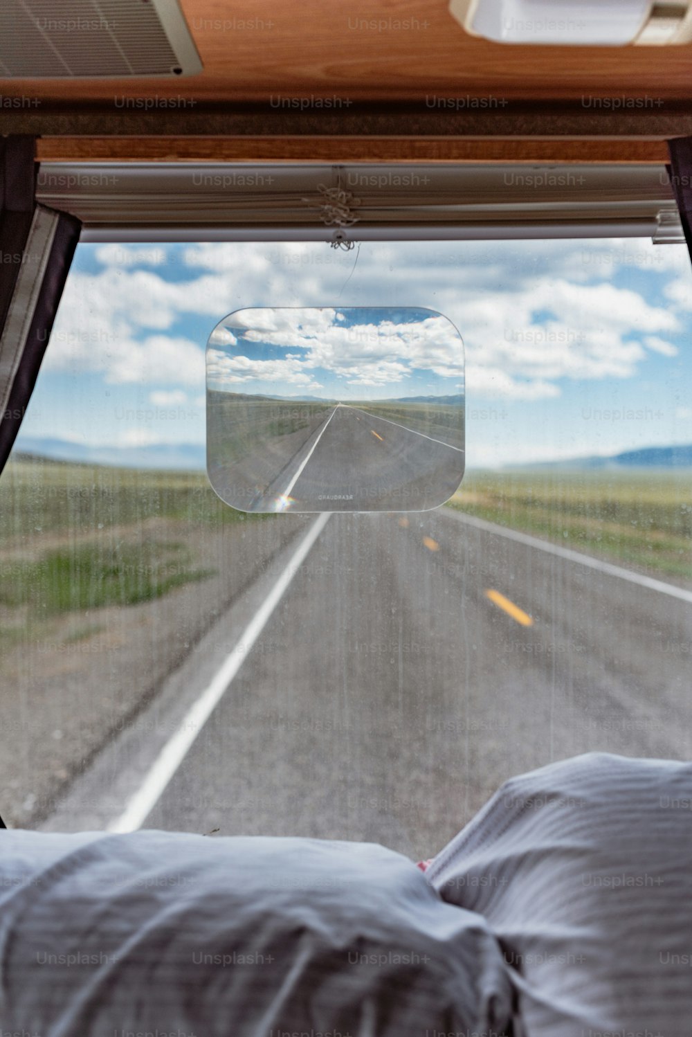 a view of a highway from inside a vehicle