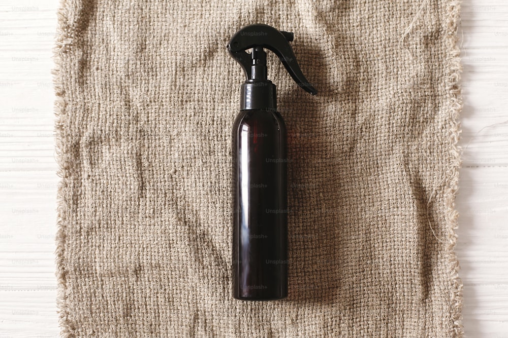 eco natural handmade detergent or shampoo flat lay on rustic background. sustainable lifestyle concept. zero waste. plastic free items. stop plastic pollution. reuse, reduce