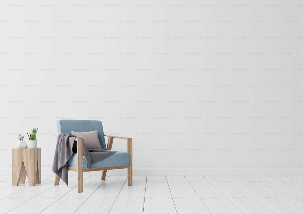 Le salon intérieur a un fauteuil bleu et une fleur sur les souches en fond de mur blanc vide, rendu 3D