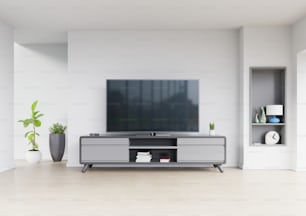 Tv design on cabinet interior modern room with plants,shelf,lamp on white wall,3D rendering