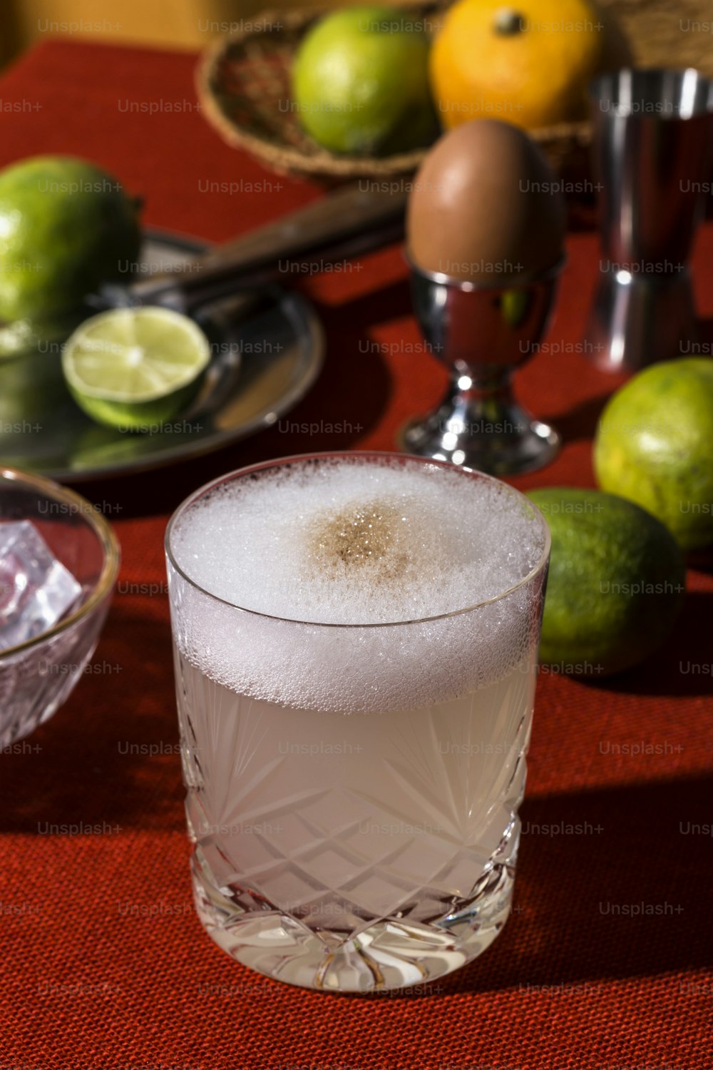 Mix the pisco, lime juice, simple syrup, and egg white in a cocktail shaker. Add ice to fill, and shake vigorously. Alternatively, you can use a blender if you don't have a shaker. Strain into an old-fashioned glass, and sprinkle the Angostura bitters on top of the foam.