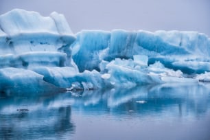 Icebergs in Jokulsarlon beautiful glacial lagoon in Iceland. Jokulsarlon is a famous travel destination in Vatnajokull National Park, southeast Iceland, Europe. Winter landscape.