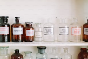 Pharmacy shelves with bottles for medicines.