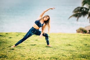Active people lifestyle in outdoor park -  beautiful caucasian adult young woman do fitness active exercise to stay healthy and beauty - diet and weight loss concept