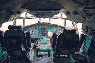 Close up of cockpit dashboard of flight instruments interior in the old civil plane