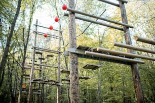 Rope park with obstacles in the forest