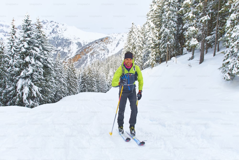 Hiking ski uphill alone in the alps