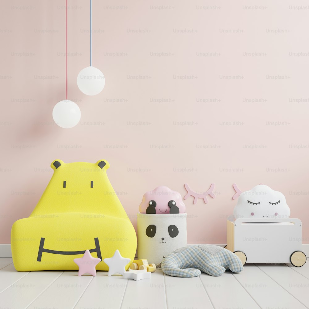 Mock up wall in the children's room with yellow sofa in light pink color wall background,3d rendering