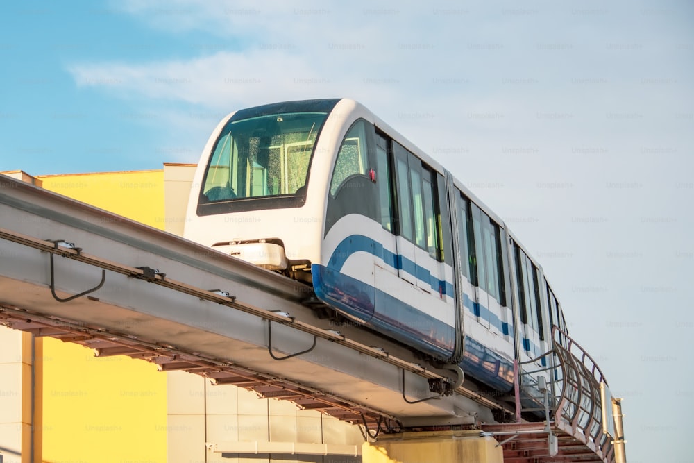 High speed subway train on the air bridge arrives at the station