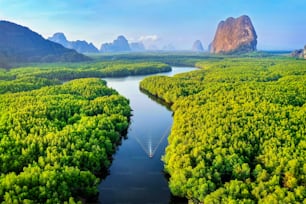 Aerial view of Phang Nga bay with mountains at sunrise in Thailand.