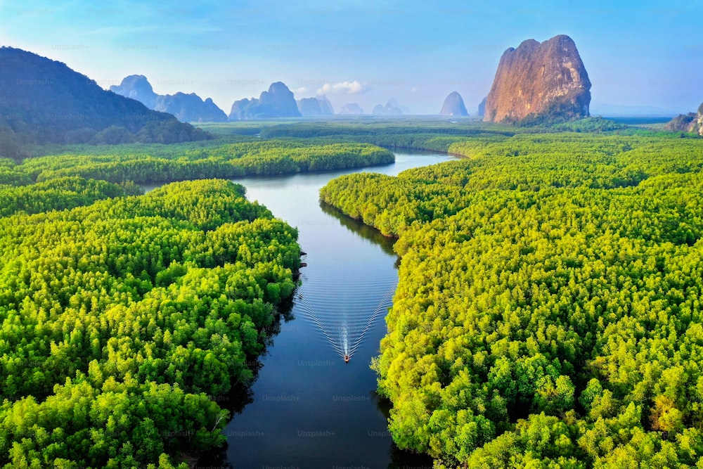 Aerial view of Phang Nga bay with mountains at sunrise in Thailand.