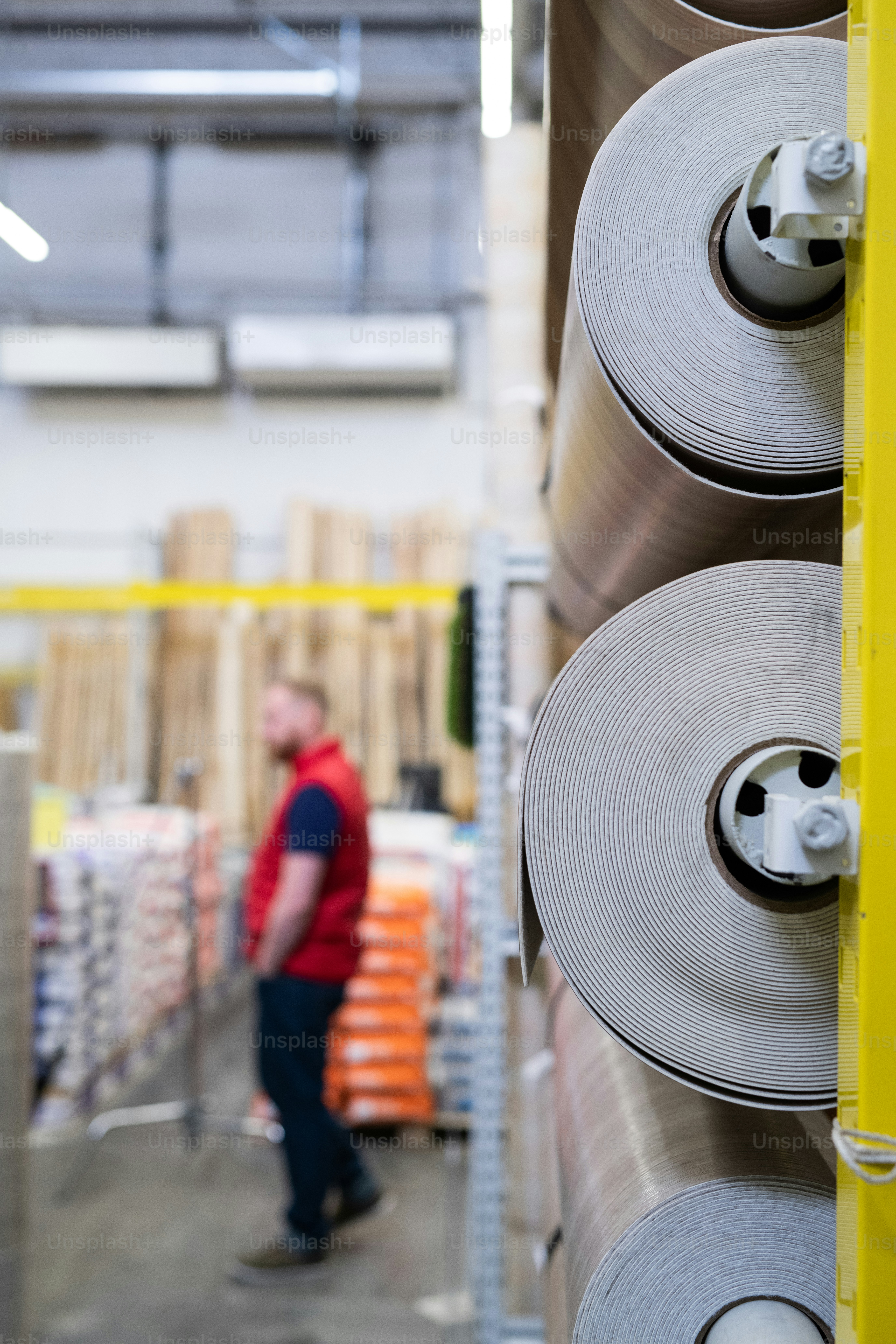 Several rolls of linoleum in hardware store