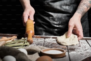 Close up of chef's hands, making fresh dough