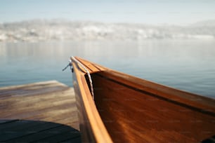 Canoe on lake in the winter morning.