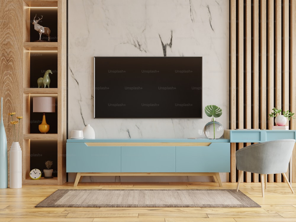 Home interior with armchair and tv cabinet on empty marble wall background.3D rendering
