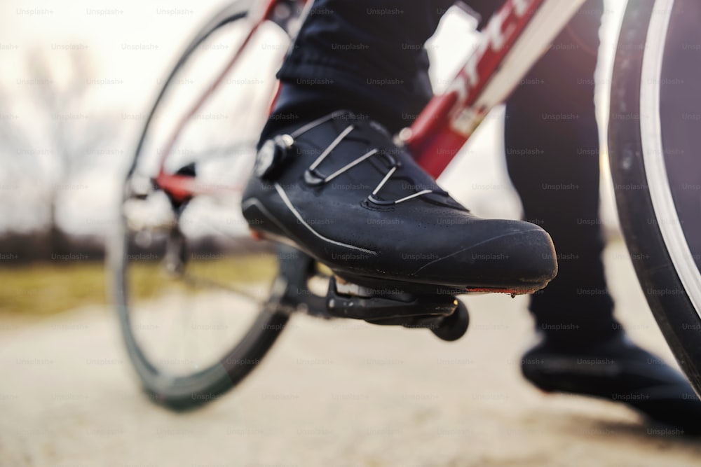 Bicycle rider's foot on pedal.
