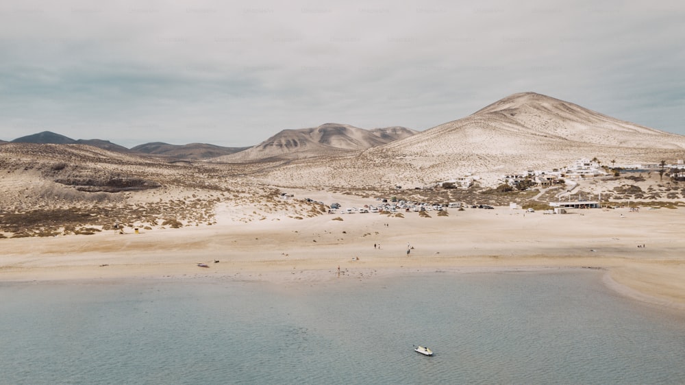 Sky aerial view of amazing sand beach and transparent caribbean sea water. Ocean landscape with blue sky and horizon in background. Colorful traveld summer vacation destination