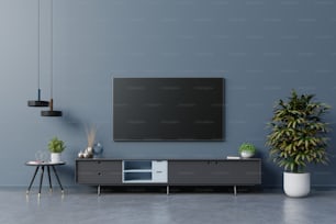 LED TV on the dark blue wall in living room,minimal design.3d rendering