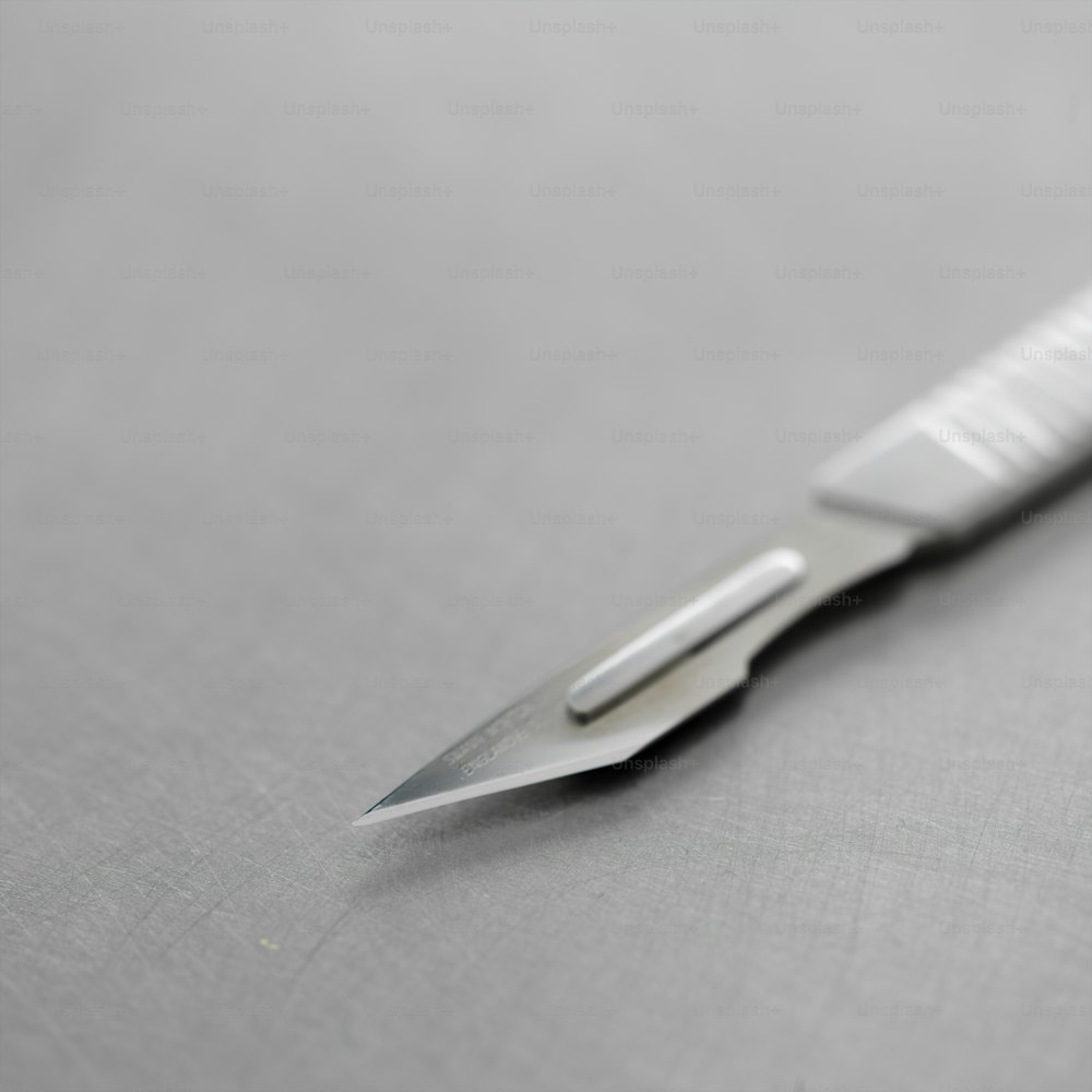 a pair of scissors sitting on top of a table