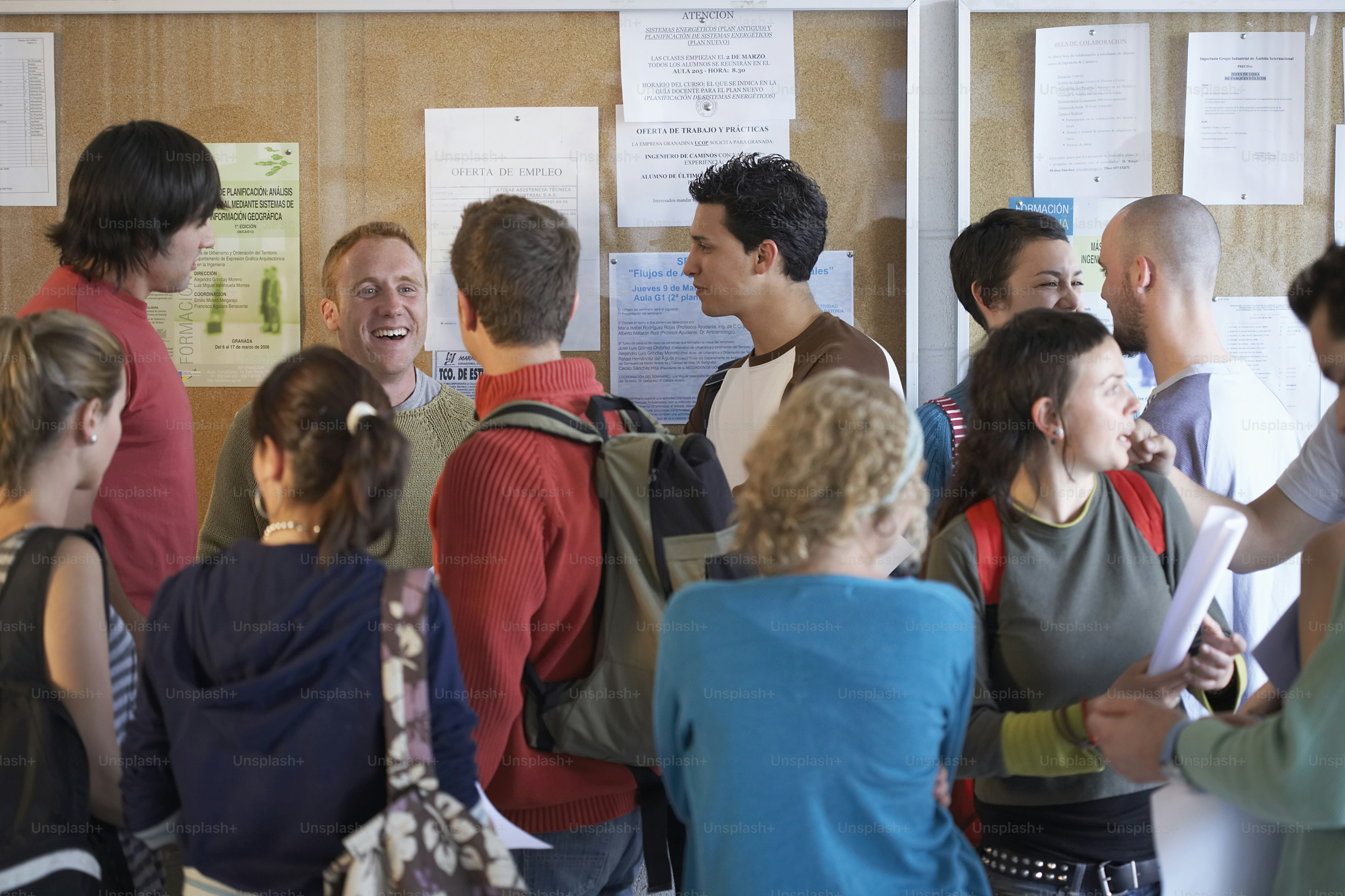 a group of people standing next to each other