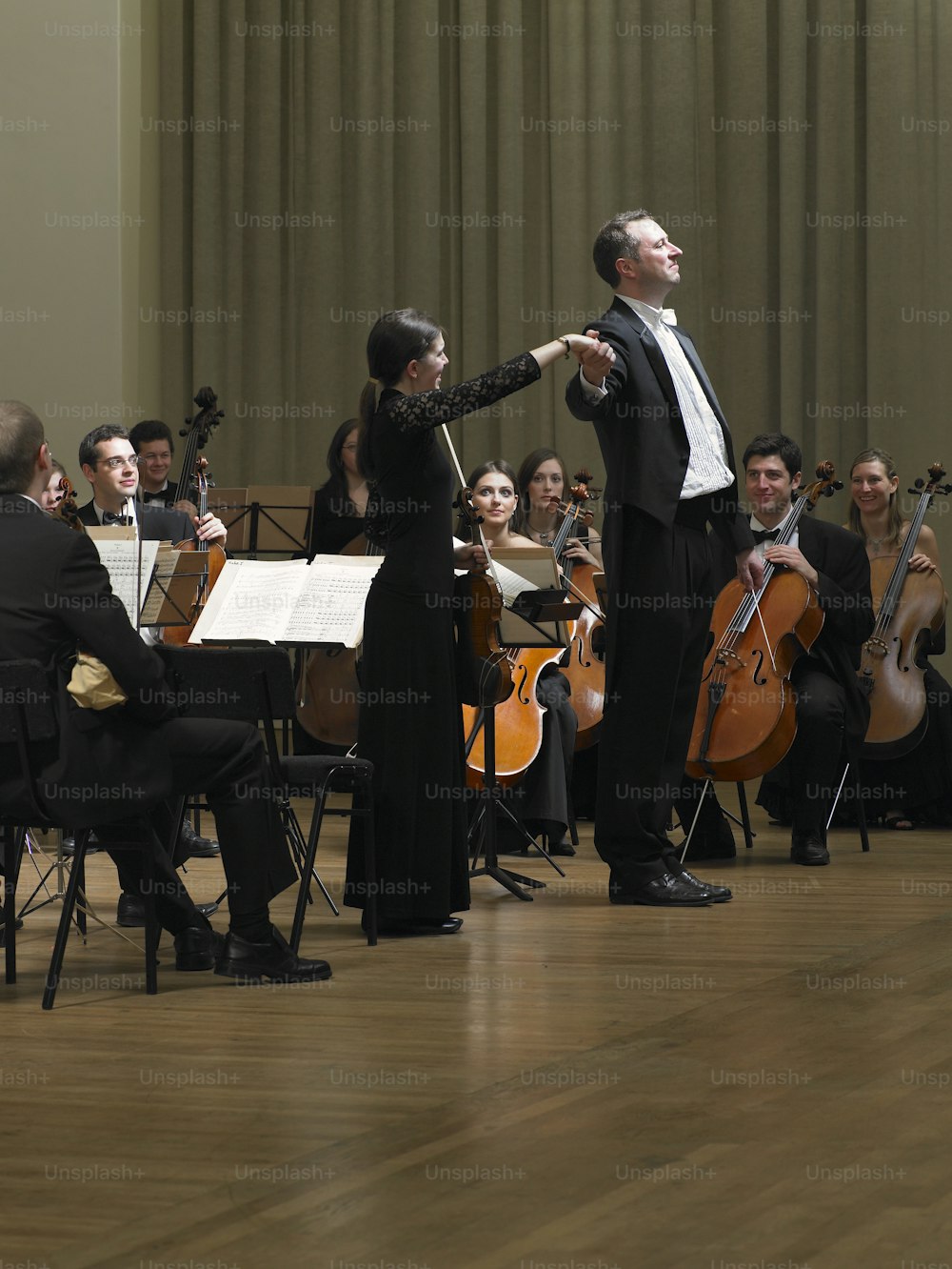 a conductor and a conductor in a orchestra