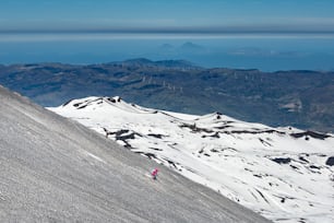 Skiing on the Etna volcano with the background of Lipari Stromboli Aeolian Islands Italy