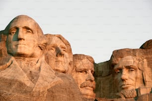 a group of presidents carved into the side of a mountain