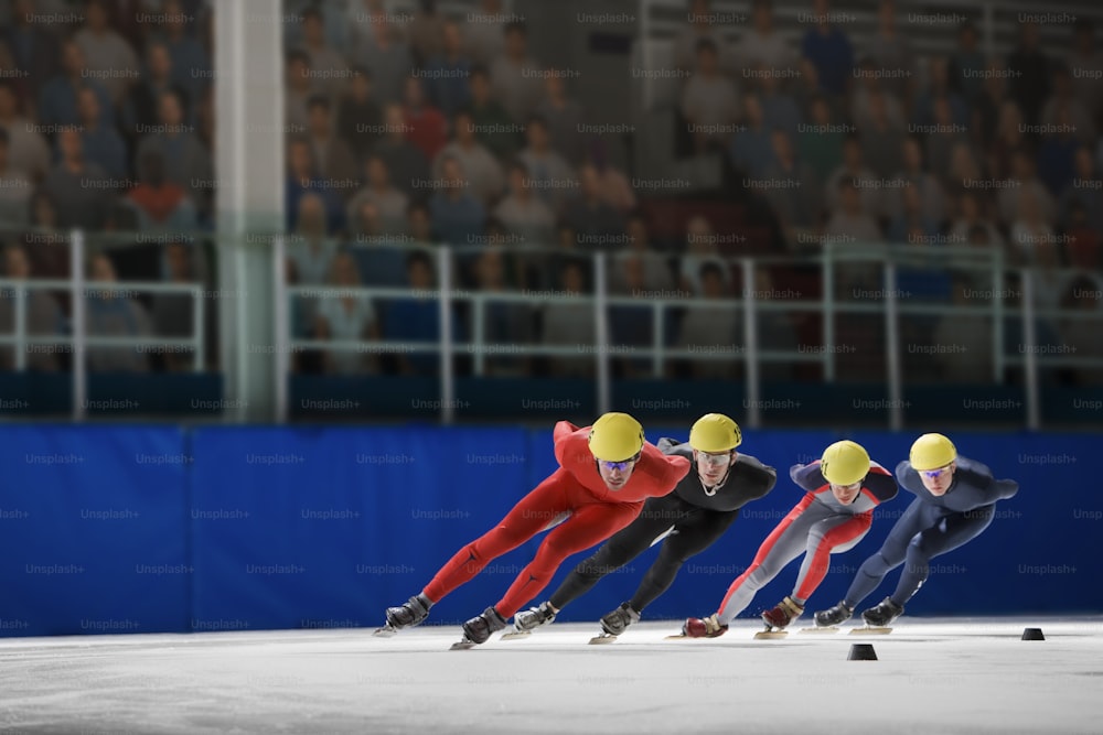 three speed skaters racing down a track in front of a crowd