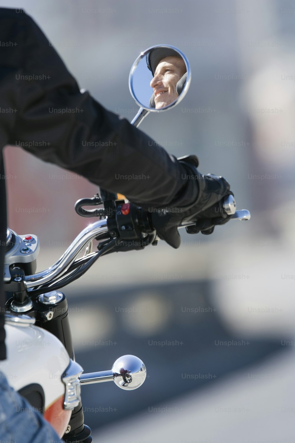 a close up of a person riding a motorcycle