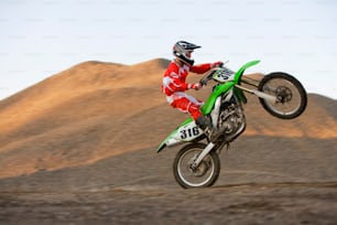 a person on a dirt bike in the air