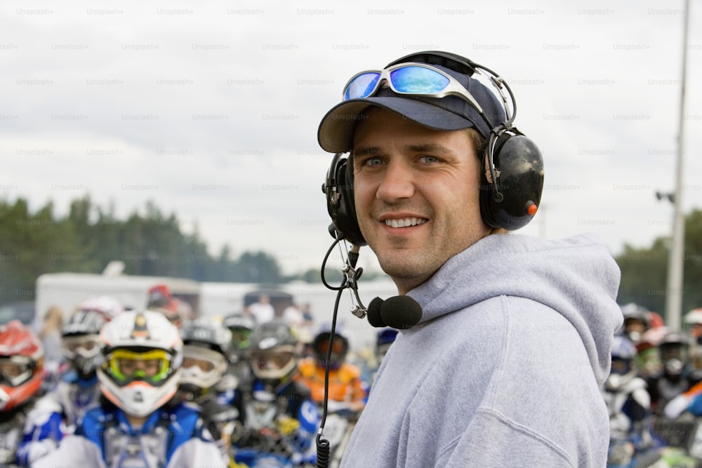 a man wearing a helmet and a headset