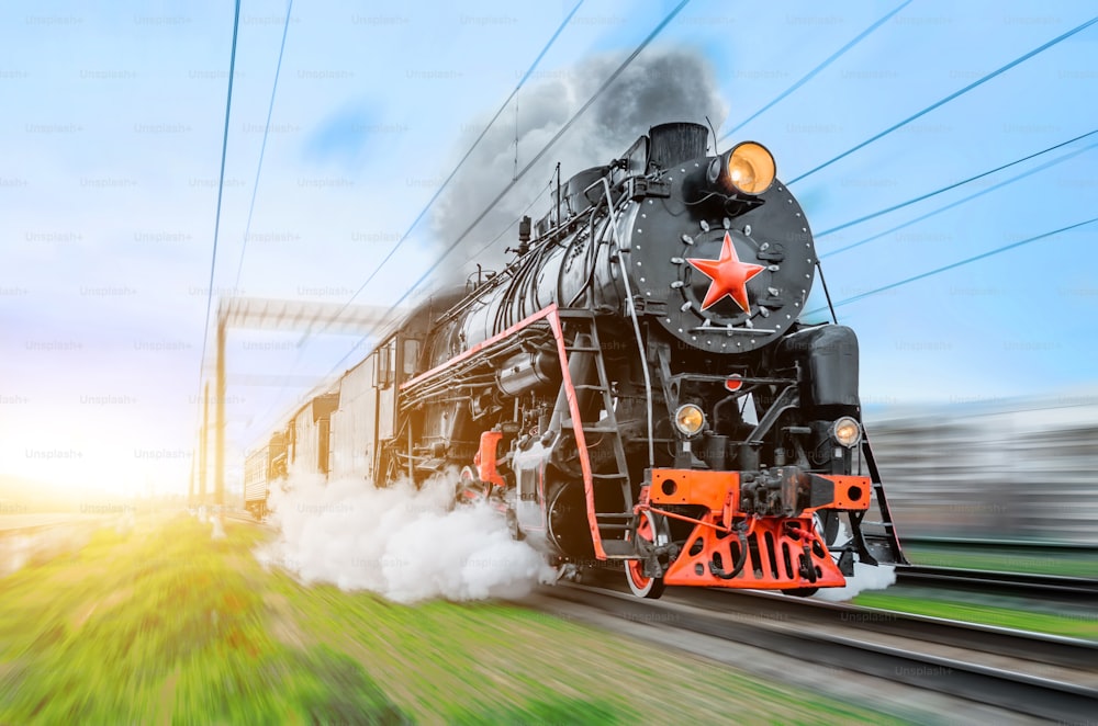 Ferrocarril de la corriente del tren de la locomotora de vapor negro de la vendimia.