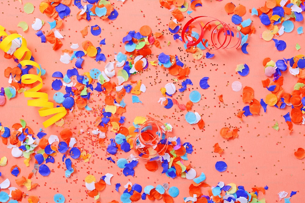 Top view of colorful party confetti background. Celebration concept