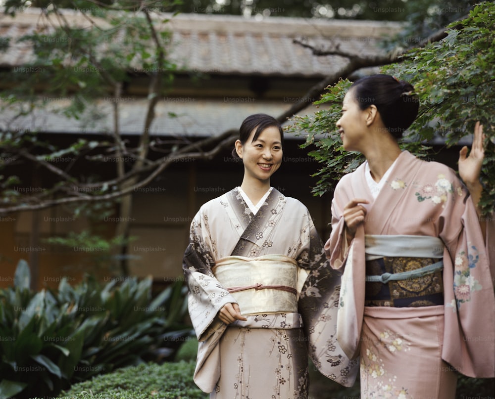 a couple of women standing next to each other