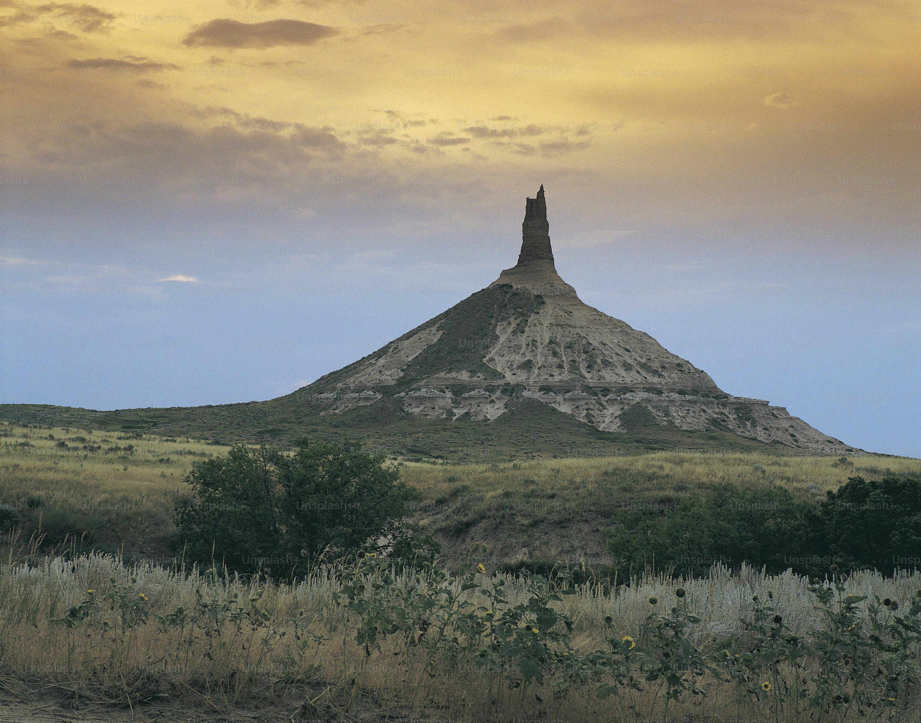 A large hill with a very tall tower on top of it photo Nebraska Image