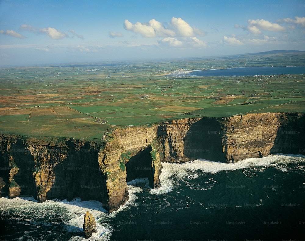 an aerial view of the cliffs and the ocean