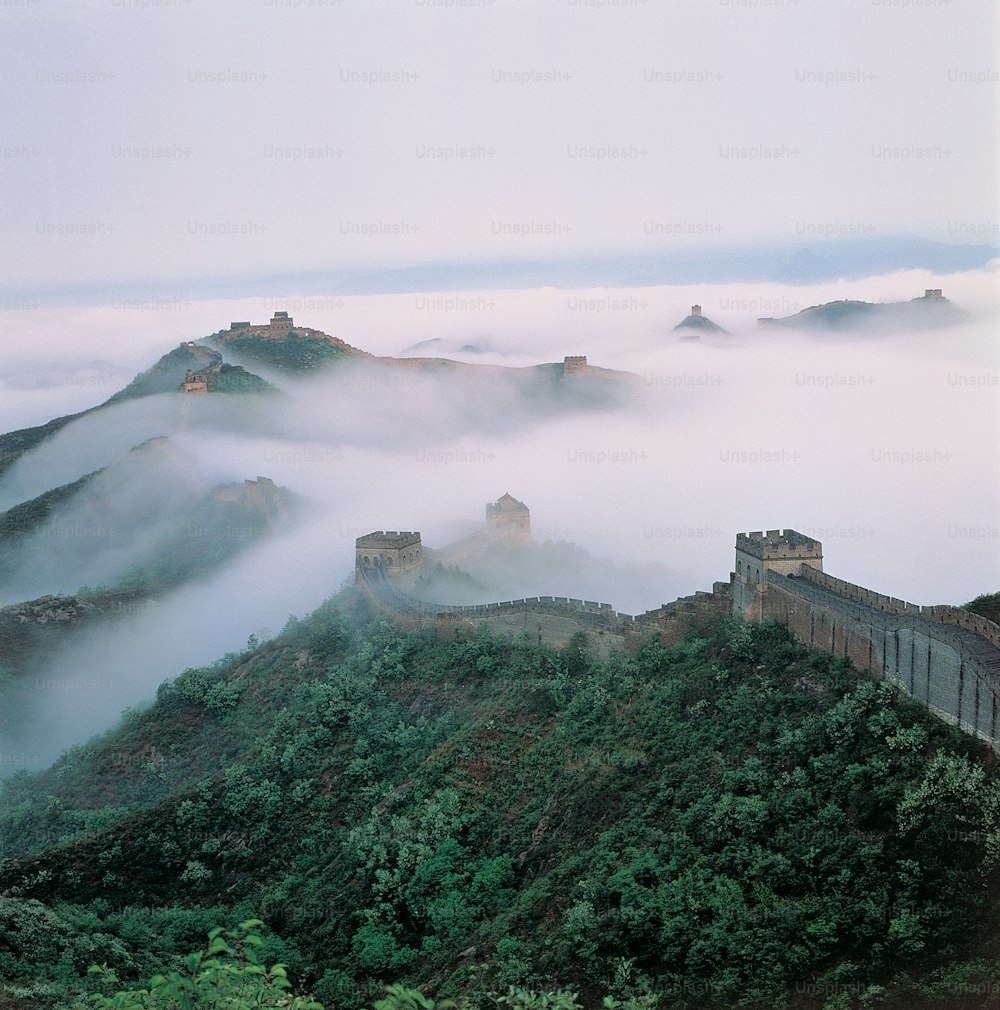 a view of the great wall of china in the fog