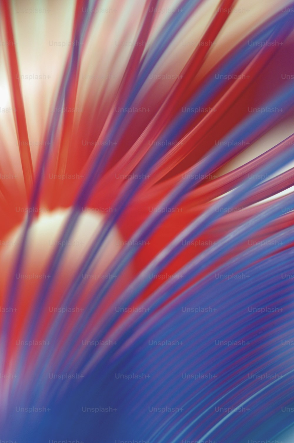 a blurry image of a red and blue object