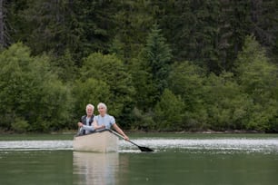 a couple of people that are in a boat