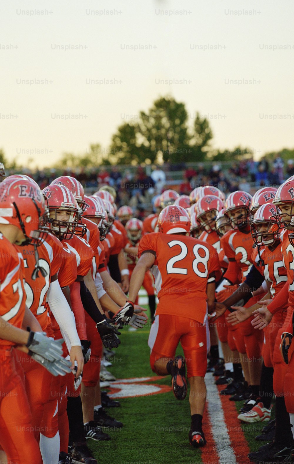 a football team is lined up on the field
