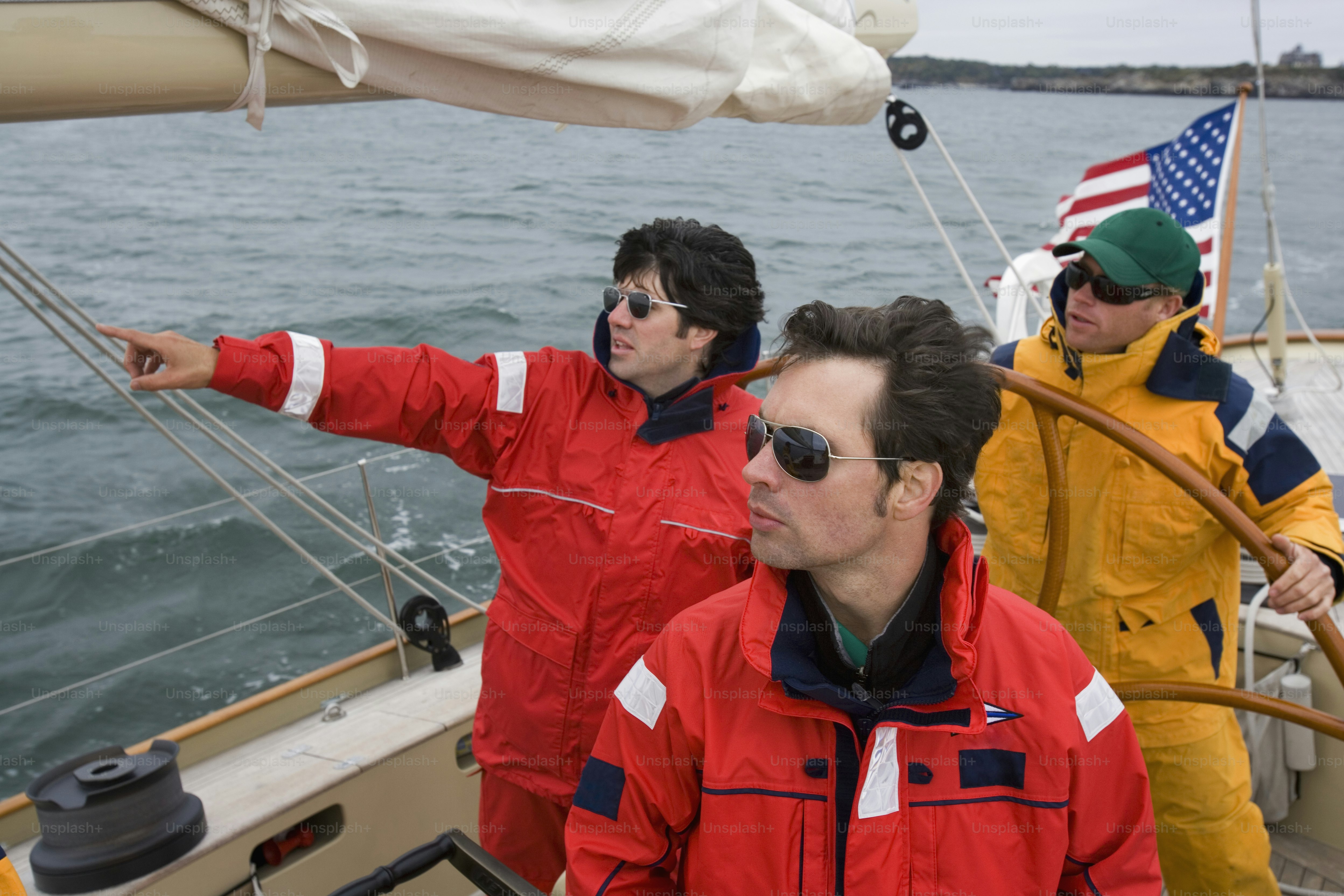 a group of people on a boat in the water
