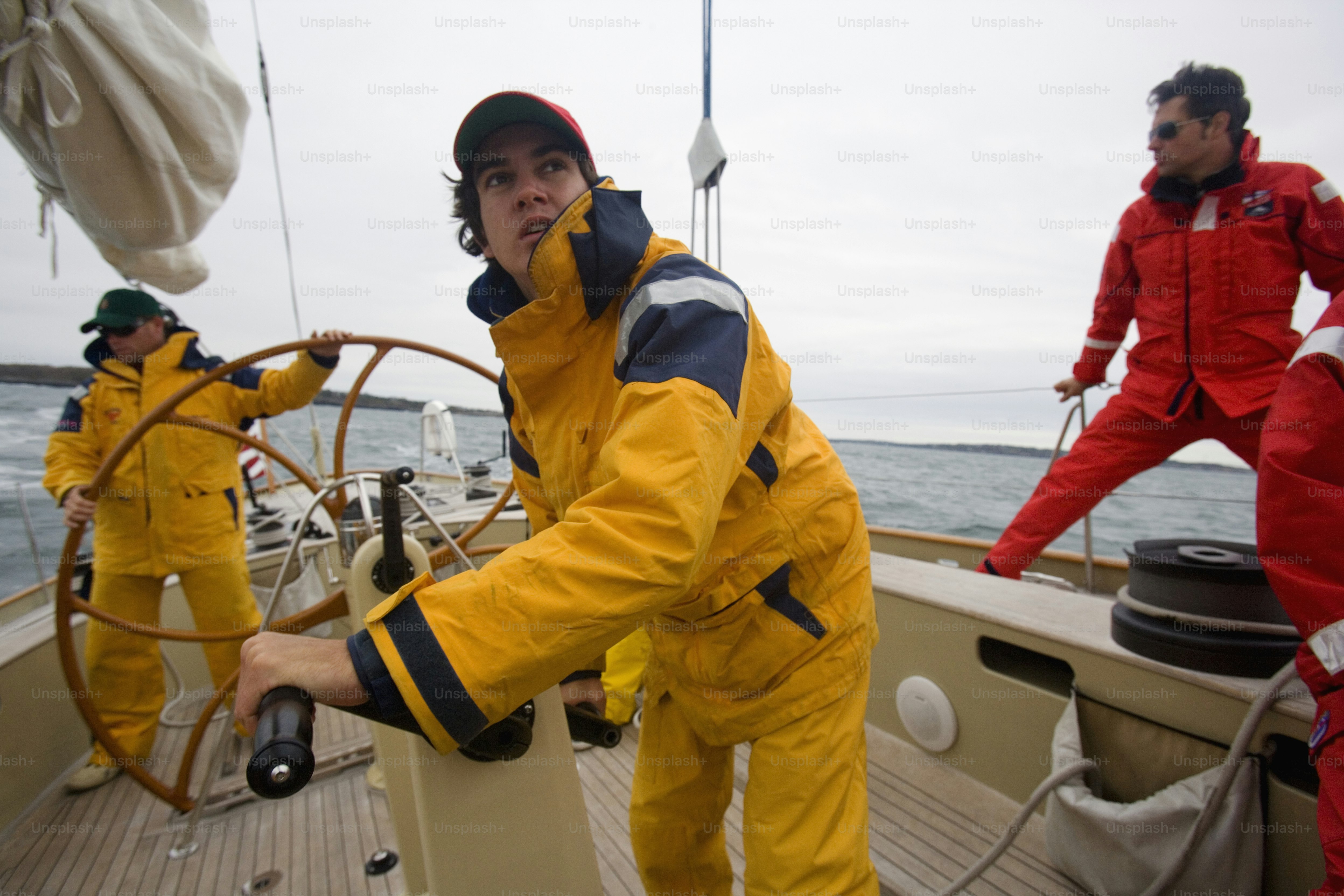 a group of people on a boat in the water