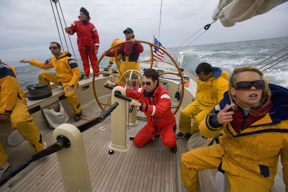 a group of people on a boat in the water