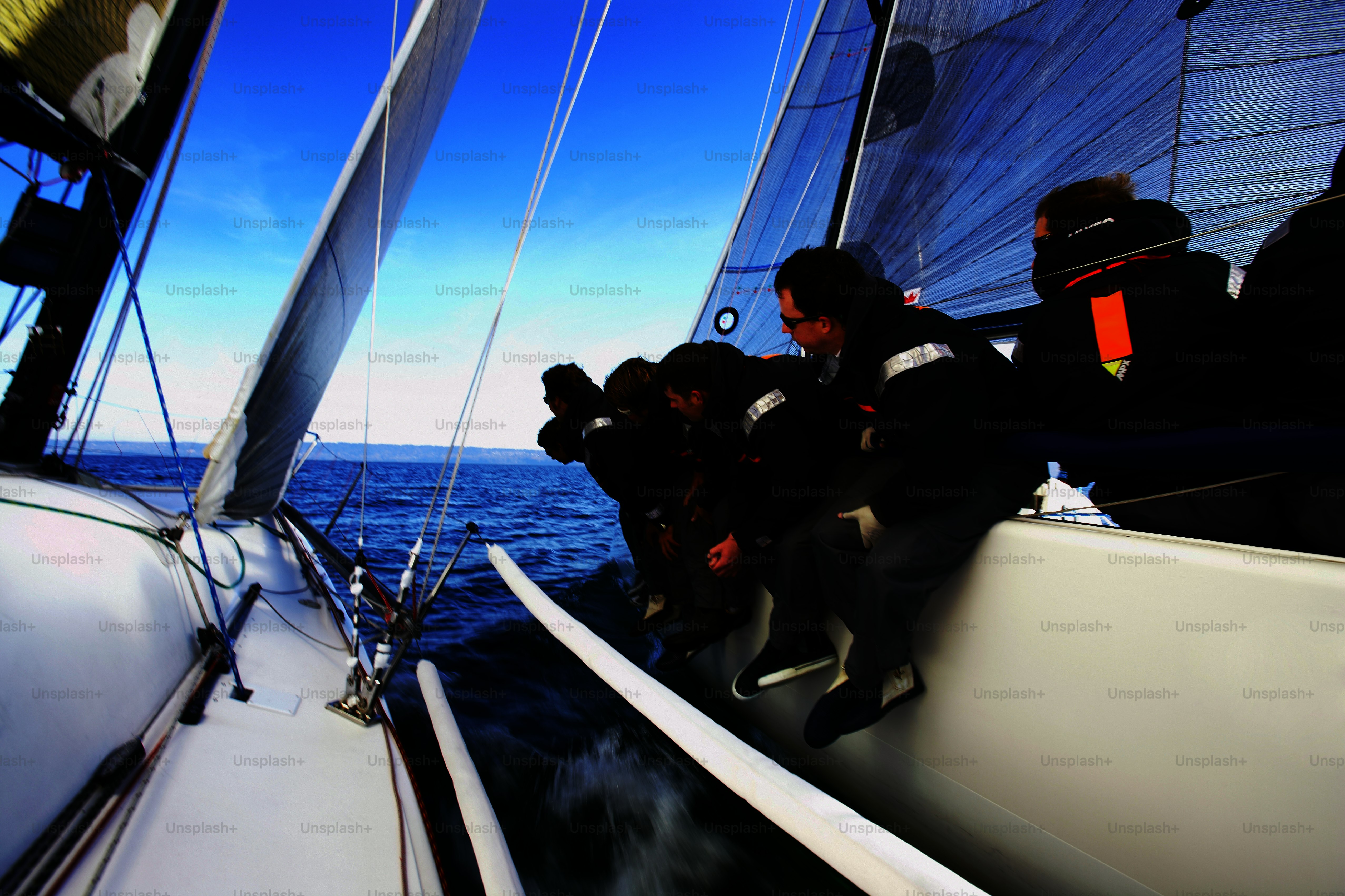 a group of people riding on the back of a boat