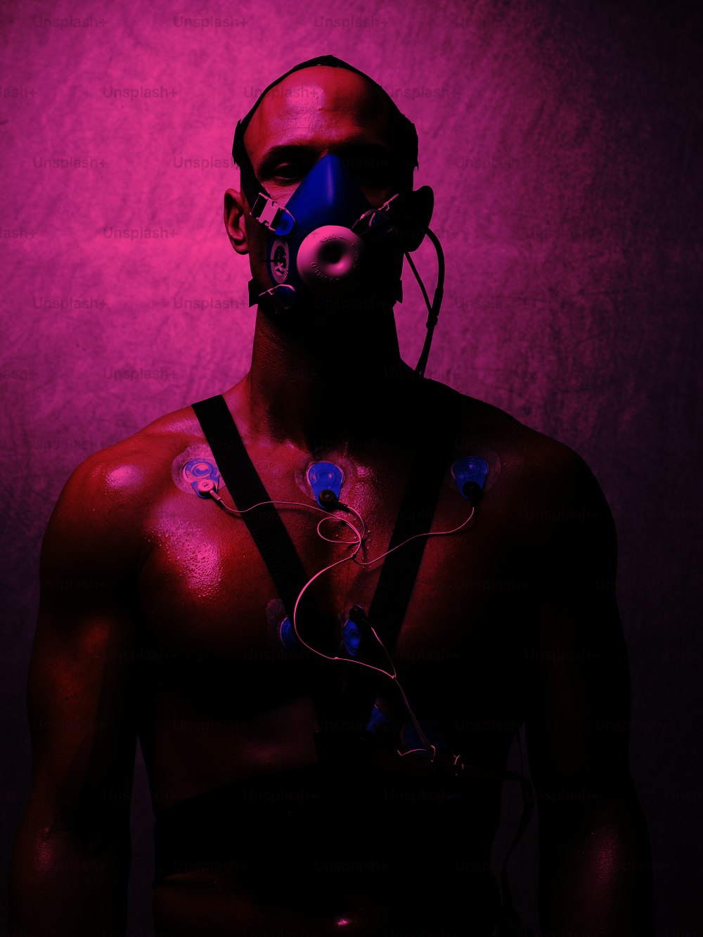 a man wearing a gas mask and harness