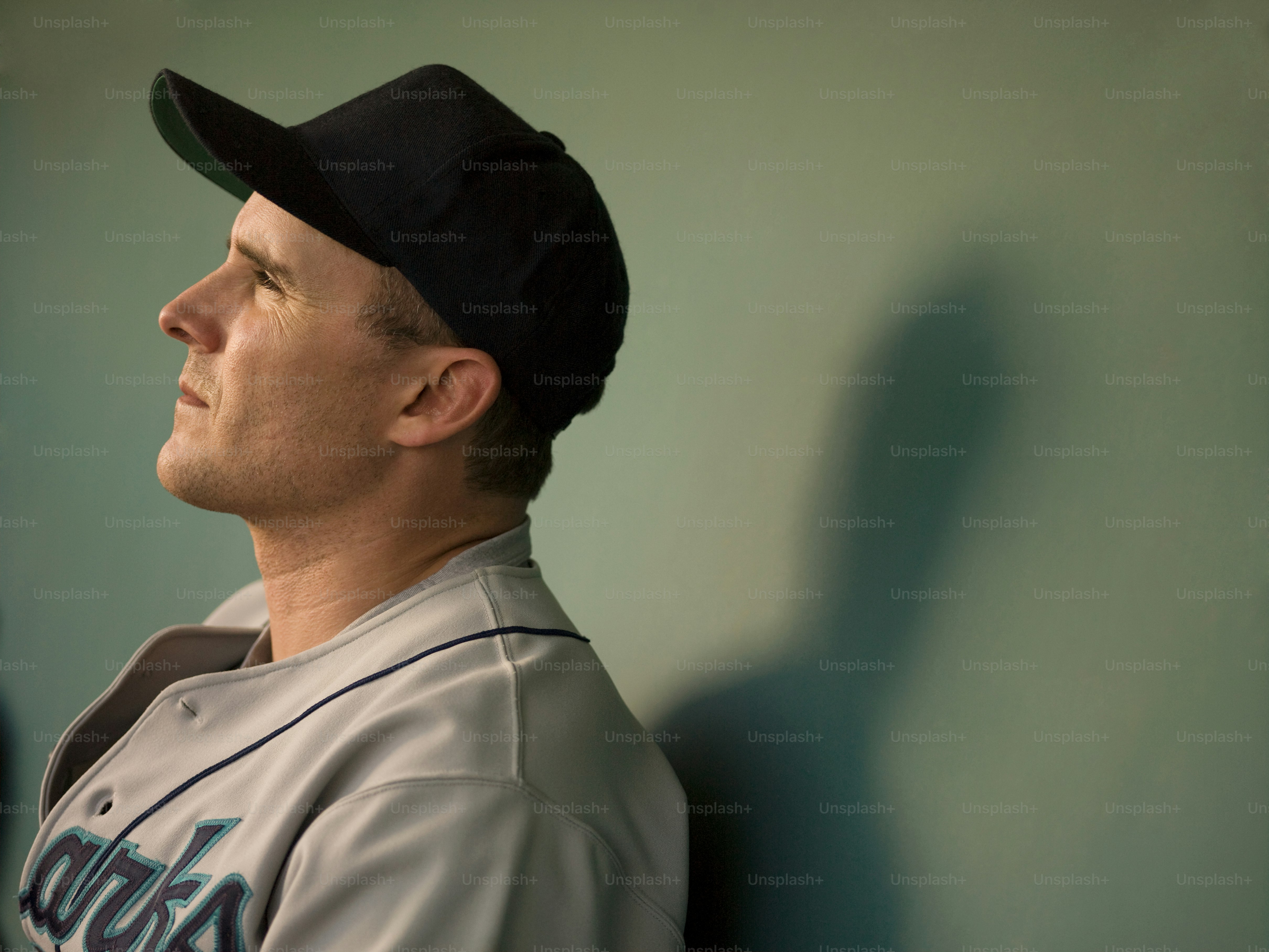 a close up of a baseball player in a uniform